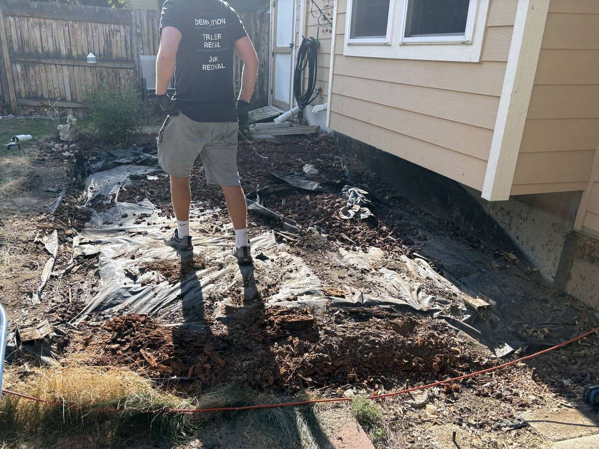 Cleared ground after the composite deck, joists, and frame were removed